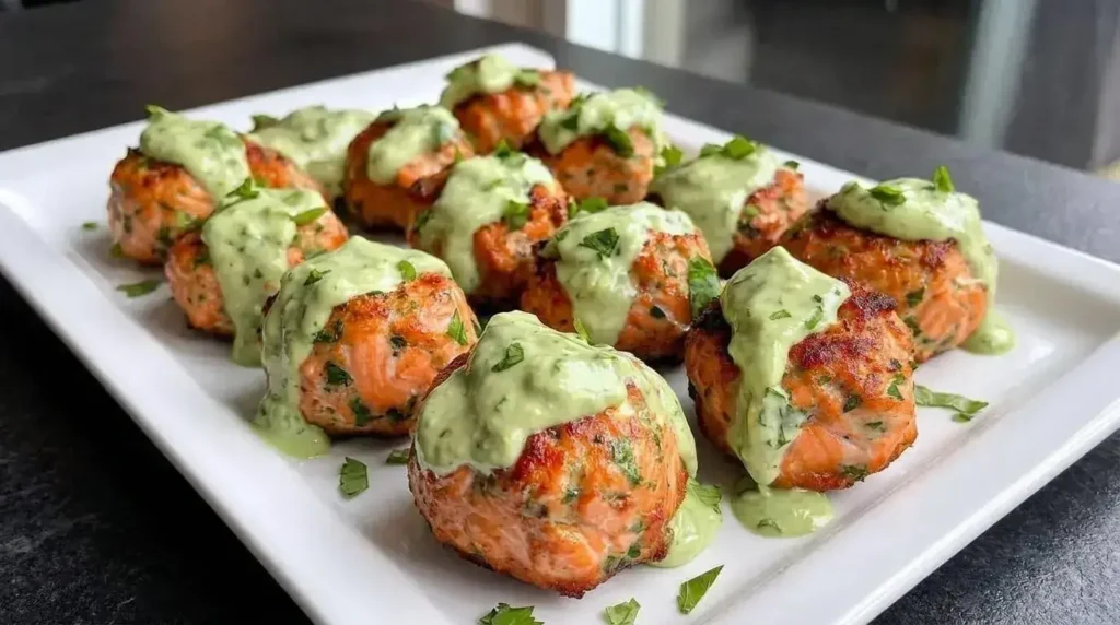 Baked Salmon Meatballs in a white tray.